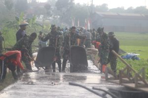 Kompak Dan Penuh Semangat, Satgas TMMD Mulai Rambah Sektor Utara