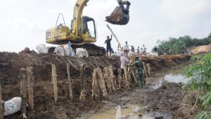 Satgas TMMD Perkuat Hasil Pembangunan Bikin Bronjong /Tanggul